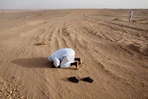 Muslims pray in the Nubian desert