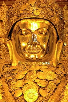 Myanmar Collection: Myanmars most famous Buddha image, 13ft high and covered in 6 inches of pure gold leaf