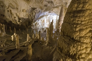 The natural show of Frasassi Caves with sharp stalactites and stalagmites, Genga The natural show of Frasassi Caves with sharp stalactites and stalagmites, Genga