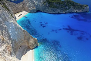 Navagio Beach and shipwreck at Smugglers Cove on the coast of Zakynthos, Ionian Islands, Greek Islands, Greece, Europe Navagio Beach and shipwreck at Smugglers Cove on the coast of Zakynthos, Ionian Islands, Greek Islands, Greece, Europe