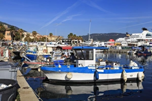 Old Port with fishing boats, cruise ship and ferries, view to distant mountains, Ajaccio Old Port with fishing boats, cruise ship and ferries, view to distant mountains, Ajaccio