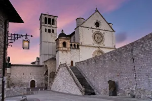Old town of Assisi and Basilica di San Francesco, UNESCO World Heritage Site, at dawn Old town of Assisi and Basilica di San Francesco, UNESCO World Heritage Site, at dawn