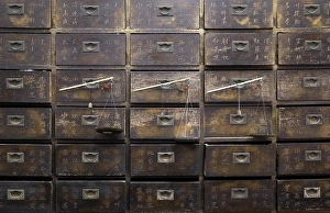 Old wooden drawers and scales in a Chinese pharmacy in Melaka (Malacca), Malaysia Old wooden drawers and scales in a Chinese pharmacy in Melaka (Malacca), Malaysia