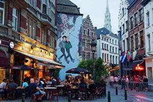 Outdoor cafes and Brousaille wall mural of a couple walking arm in arm Outdoor cafes and Brousaille wall mural of a couple walking arm in arm