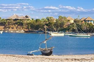 Mahajanga Collection: Outrigger boat lying on bank of sand, Antsanitian Beach Resort, Mahajanga, Madagascar, Indian Ocean