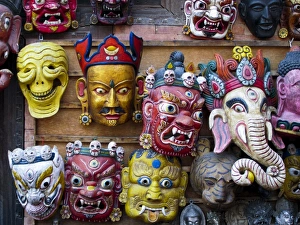 Painted face masks on display in the historical Newar city of Bhaktapur, Nepal, Asia Painted face masks on display in the historical Newar city of Bhaktapur, Nepal, Asia