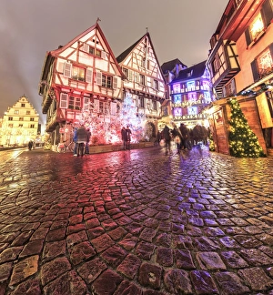 Panorama of typical houses enriched by Christmas ornaments and lights at dusk, Colmar Panorama of typical houses enriched by Christmas ornaments and lights at dusk, Colmar