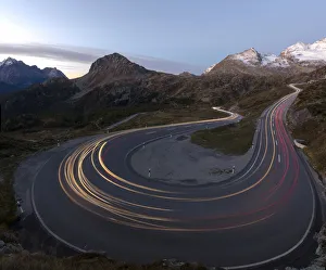 Panoramic of lights of car traces, Bernina Pass, Poschiavo Valley, Engadine, Canton of Graubunden Panoramic of lights of car traces, Bernina Pass, Poschiavo Valley, Engadine, Canton of Graubunden
