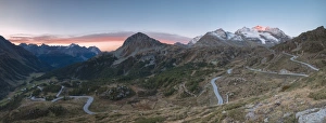 Panoramic of the road bends of Bernina Pass at dawn, Poschiavo Valley, Engadine Panoramic of the road bends of Bernina Pass at dawn, Poschiavo Valley, Engadine
