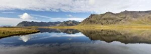 Related Images Gallery: Panoramic view of mountains and blue sky reflecting in lake, near Vik, South Iceland