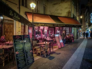 Lit Up Collection: Parisian cafe and street scene, Paris, France, Europe