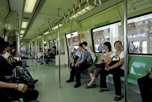 Carriages Gallery: Passengers on a mass rapid transit train in Singapore, Southeast Asia, Asia