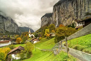 Path in the autumn landscape of Lauterbrunnen village towards Trummelbach Falls Path in the autumn landscape of Lauterbrunnen village towards Trummelbach Falls