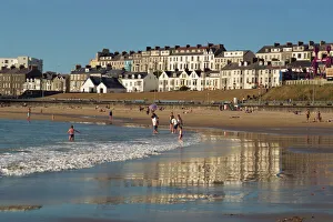 People on the beach at Portrush Print