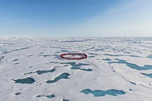 People forming a circle to memorise to have arrived on the North Pole, Arctic People forming a circle to memorise to have arrived on the North Pole, Arctic
