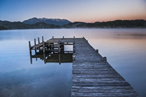 Pier on Lake Nahuel Huapi during a misty sunrise, Villa la Angostura, Neuquen, Patagonia Pier on Lake Nahuel Huapi during a misty sunrise, Villa la Angostura, Neuquen, Patagonia