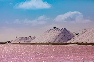 Pink colored ocean overlooking the Salt Pyramids of Bonaire, Netherlands Antilles Pink colored ocean overlooking the Salt Pyramids of Bonaire, Netherlands Antilles