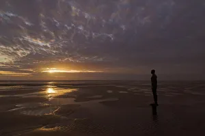 Sculpture Gallery: Another Place statues by artist Antony Gormley on Crosby beach, Merseyside