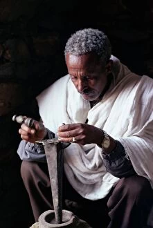 African American Gallery: Portrait of a blacksmith at work, town of Axoum (Axum) (Aksum), Tigre region