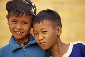 Portrait of two boys of the Akha hill tribe in western Portrait of two boys of the Akha hill tribe in western