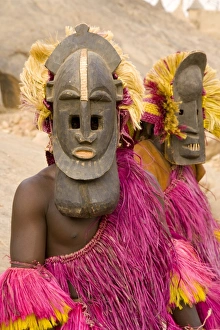 Portrait of masked ceremonial Dogon dancers near Sangha, Bandiagara escarpment Portrait of masked ceremonial Dogon dancers near Sangha, Bandiagara escarpment