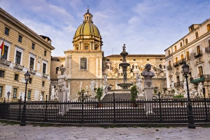 Pretoria Fountain in Piazza Pretoria with the dome of Church of San Giuseppe dei Teatini, Palermo, Sicily, Italy Pretoria Fountain in Piazza Pretoria with the dome of Church of San Giuseppe dei Teatini, Palermo, Sicily, Italy