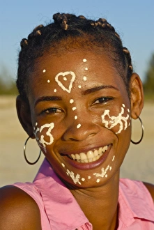 Pretty Madagascan girl with traditional paint on her face, Morondave, Madagascar, Africa Pretty Madagascan girl with traditional paint on her face, Morondave, Madagascar, Africa