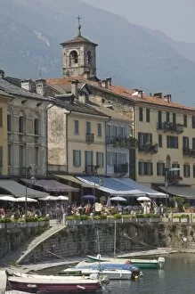 Images Dated 23rd May 2009: Promenade cafes by the old harbour, Cannobio, Lago Maggiore, Switzerland, Europe