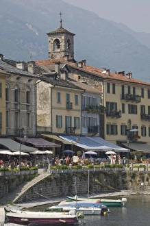 Images Dated 23rd May 2009: Promenade cafes by the old harbour, Cannobio, Lago Maggiore, Switzerland, Europe