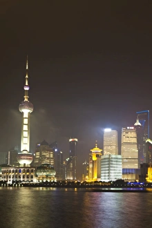 Pudong financial district and Oriental Pearl Tower across the Huangpu River, Shanghai Pudong financial district and Oriental Pearl Tower across the Huangpu River, Shanghai