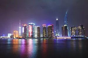Skylines Gallery: Pudong skyline at night across the Huangpu River, Shanghai, China, Asia
