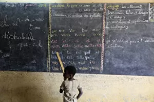 Images Dated 8th February 2014: Pupil at the blackboard, primary school, Lome, Togo, West Africa, Africa
