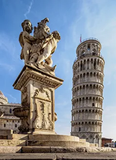 Putti Fountain and Leaning Tower, Piazza dei Miracoli, UNESCO World Heritage Site Putti Fountain and Leaning Tower, Piazza dei Miracoli, UNESCO World Heritage Site
