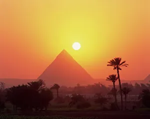 Pyramid silhouetted at sunset, Giza, UNESCO World Heritage Site, Cairo Pyramid silhouetted at sunset, Giza, UNESCO World Heritage Site, Cairo