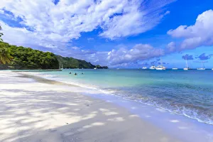 Quiet Caribbean, family play in turquoise sea, white sand beach, beautiful Port Elizabeth Quiet Caribbean, family play in turquoise sea, white sand beach, beautiful Port Elizabeth