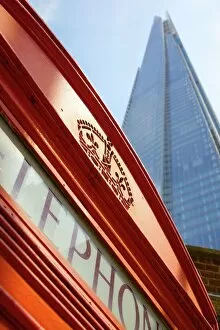Red telephone box and The Shard, London, England, United Kingdom, Europe