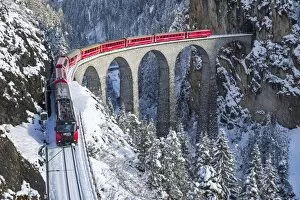 Images Dated 15th January 2014: The red train of the Albula-Bernina Express Railway, UNESCO World Heritage on the Landwasser
