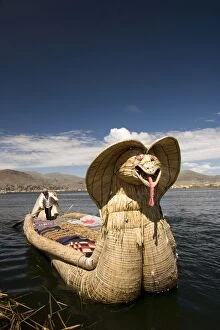 Images Dated 25th December 2005: Reed boat with decorative bow, amid floating islands of the Uros people