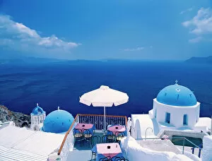 Places Of Worship Gallery: Restaurant by ocean, Oia, Santorini, Cyclades, Greek Islands, Greece, Europe
