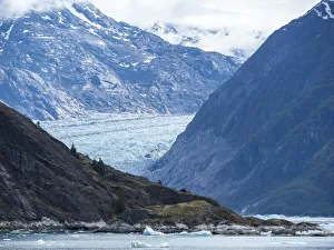 Retreating tidewater South Sawyer Glacier meets the rock, Tracy Arm, Southeast Alaska Retreating tidewater South Sawyer Glacier meets the rock, Tracy Arm, Southeast Alaska