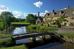 River Eye flowing through the pretty village of Lower Slaughter, the Cotswolds River Eye flowing through the pretty village of Lower Slaughter, the Cotswolds