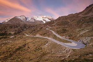 Road bends of Bernina Pass at dawn, Poschiavo Valley, Engadine, Canton of Graubunden Road bends of Bernina Pass at dawn, Poschiavo Valley, Engadine, Canton of Graubunden
