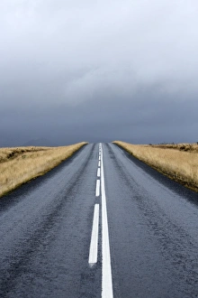 Road stretching away towards stormy sky, Snaefellsnes Peninsula, Iceland, Polar Regions Road stretching away towards stormy sky, Snaefellsnes Peninsula, Iceland, Polar Regions