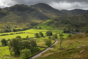 Rolling farmland and mountains in Little Langdale, Lake District National Park, UNESCO Rolling farmland and mountains in Little Langdale, Lake District National Park, UNESCO