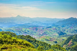 Rolling hills and mountains, lush rural landscape, Vientiane Province, Laos, Indochina Rolling hills and mountains, lush rural landscape, Vientiane Province, Laos, Indochina