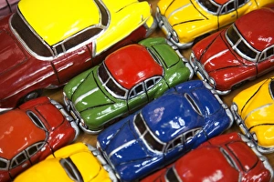 Rows of colourful model traditional American cars for sale to tourists Rows of colourful model traditional American cars for sale to tourists
