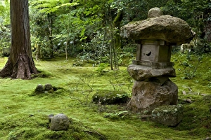 A rugged stone lantern accents a moss garden at Sanzenin Temple in Ohara A rugged stone lantern accents a moss garden at Sanzenin Temple in Ohara