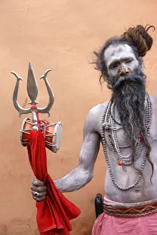 Sadhu with Shiva trident attending Haridwar Kumbh Mela, Haridwar, Uttarakhand, India Sadhu with Shiva trident attending Haridwar Kumbh Mela, Haridwar, Uttarakhand, India