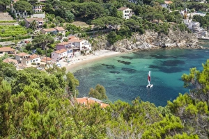 Sailboat in the turquoise sea, Porto Azzurro, Elba Island, Livorno Province, Tuscany Sailboat in the turquoise sea, Porto Azzurro, Elba Island, Livorno Province, Tuscany