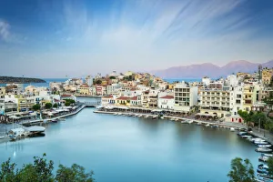 Seaside town resort of Agios Nikolaos by lake Voulismeni, Lasithi prefecture, Crete Seaside town resort of Agios Nikolaos by lake Voulismeni, Lasithi prefecture, Crete